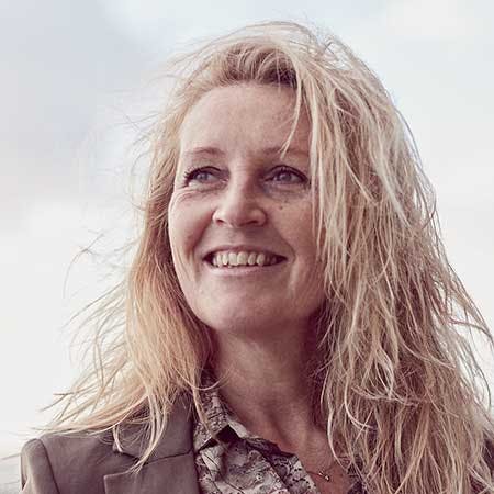 Katrine Asp-Poulsen er Executive Advisor hos NewPath. Her hjælper Katrine virksomhedsledere med at implementere og kommunikere bæredygtig forandringer.